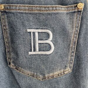 Balmain Light Blue Denim Jeans with Gold Logo Button